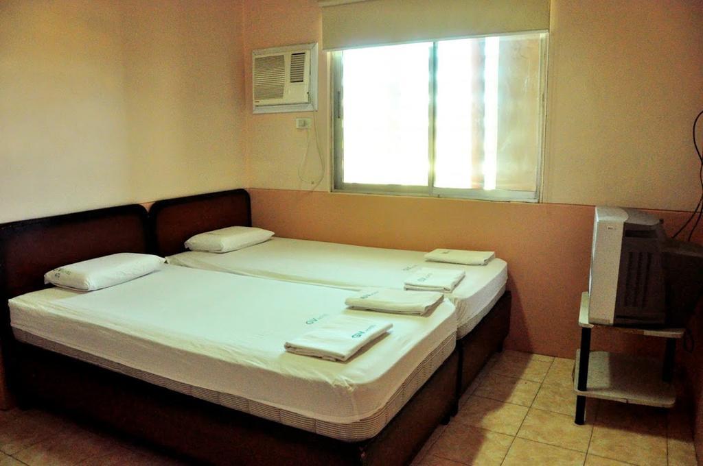 GV Hotel - Camiguin Mambajao Habitación foto
